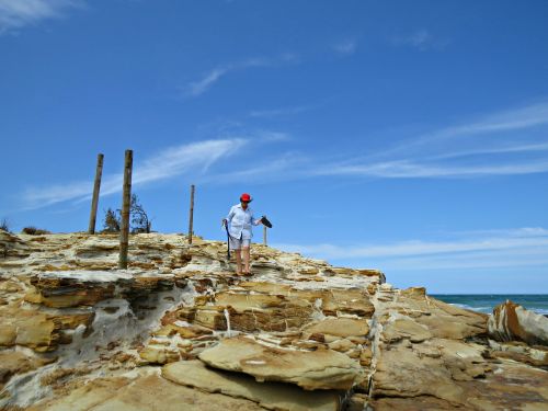 rocks beach lady