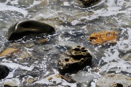 Rocks And Ocean Water