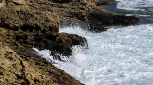 rocky coast wave smashing