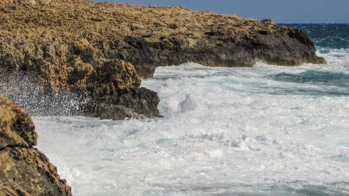 rocky coast waves splashing
