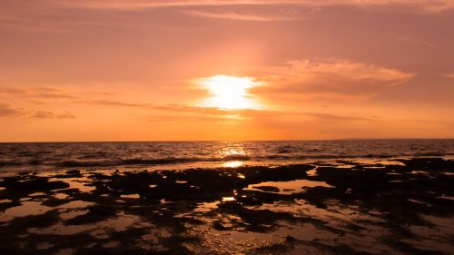 rocky coast sunset sea
