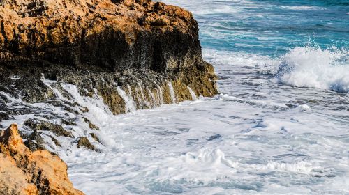 rocky coast waves sea