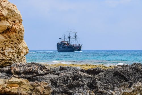 rocky coast landscape pirate ship
