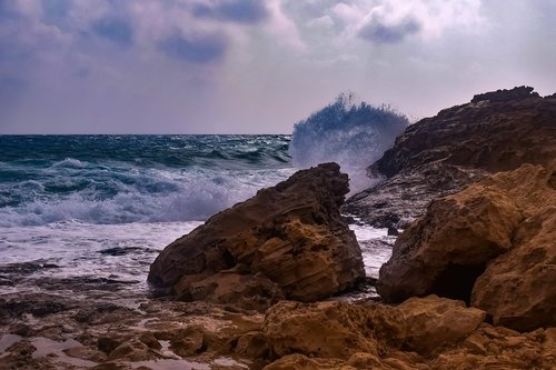 rocky coast  sea  waves