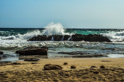 rocky coast  wave  smashing