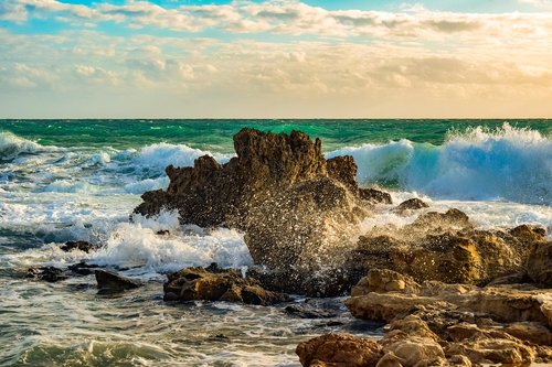 rocky coast  wave  smashing