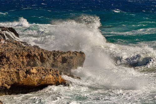 rocky coast  wave  crashing