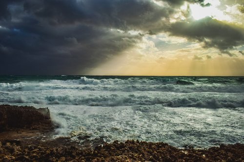 rocky coast  storm  sea