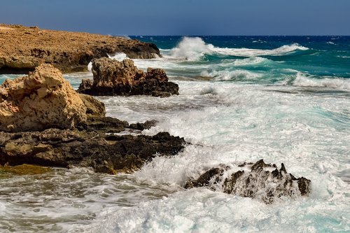 rocky coast  waves  smashing