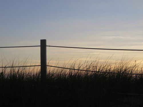 rope fence silhouette sunset
