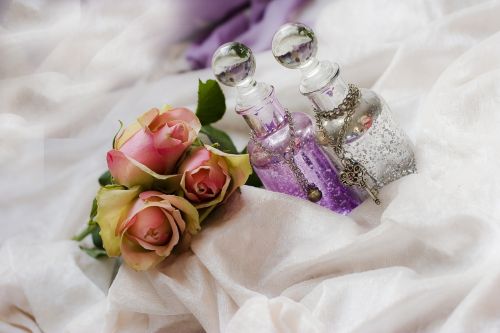 roses bottles purple