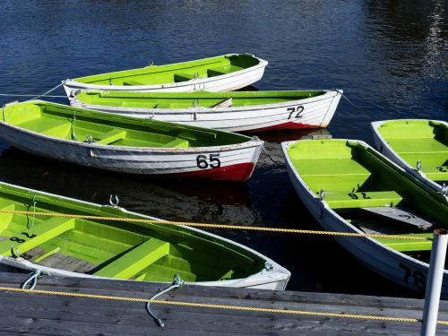row boats green wooden