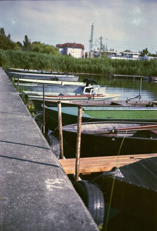 rowboats shore lake