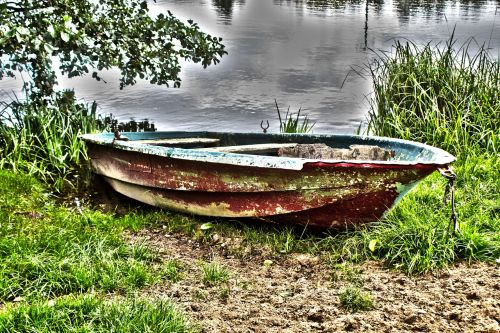 rowing boat boats bank