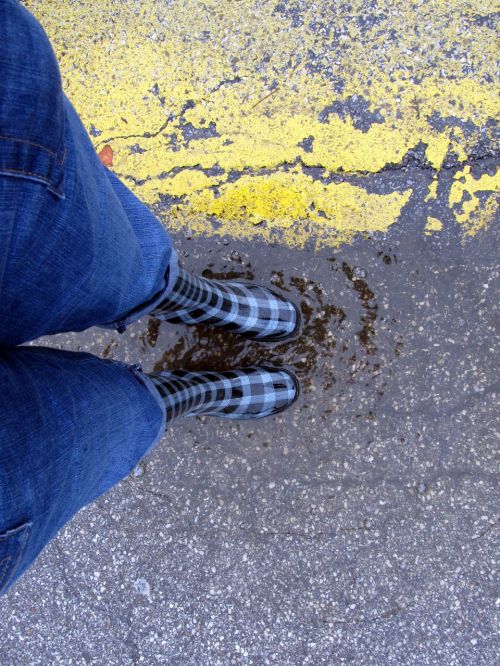 rubber boots rain puddle