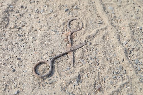 rust  scissors  sand