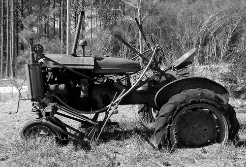 rustic tractor  abandoned  antique