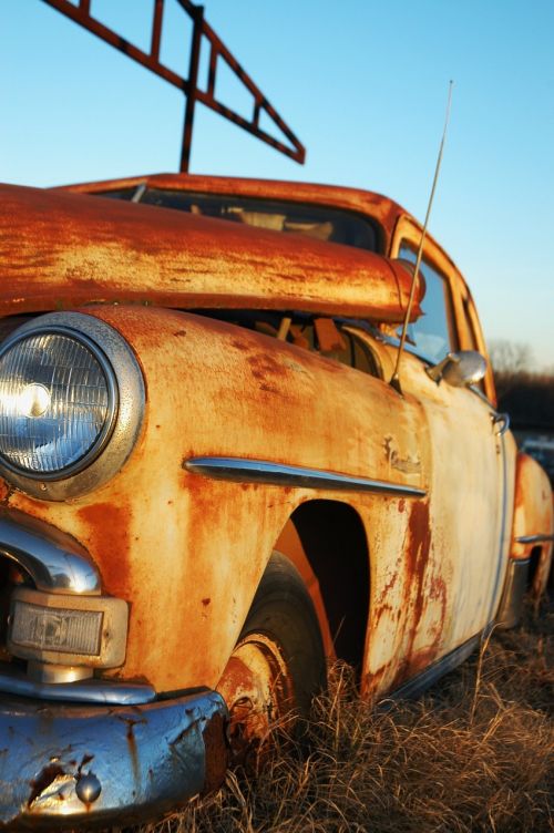 rusty car abandoned junkyard