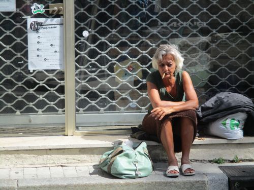 homeless sad woman