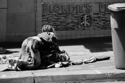 homeless street sad woman