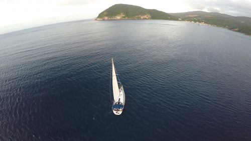 sailboat mountain sea