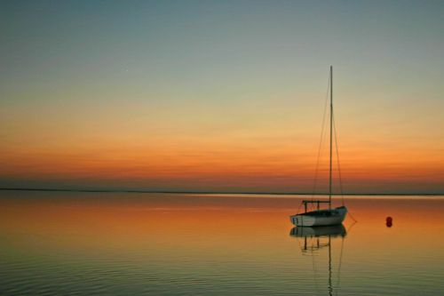 sailboat sailing sunset