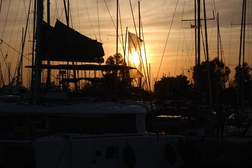 sailboat  sunset  sailing
