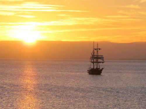 sailboat sunset ship