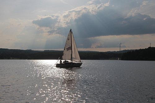 sailing boat  lake  water