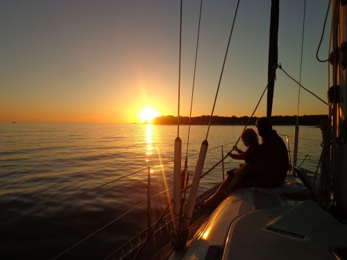 sailing boat sunset sea