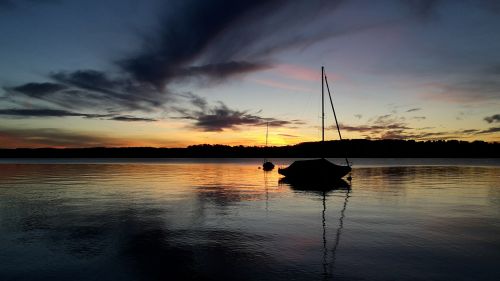 sailing boat sunset lake