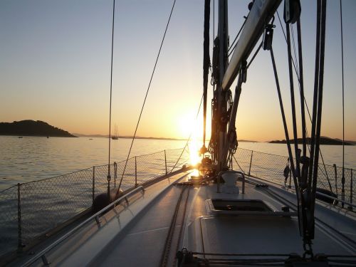 sailing boat sunset sea