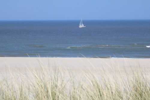 sailing vessel dunes beach