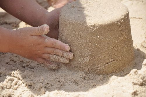 sand hand beach