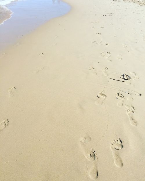 sand sea footprints