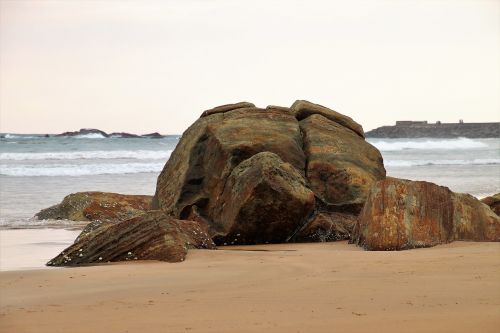 sand ocean rock