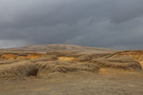sand dunes dark sky sand