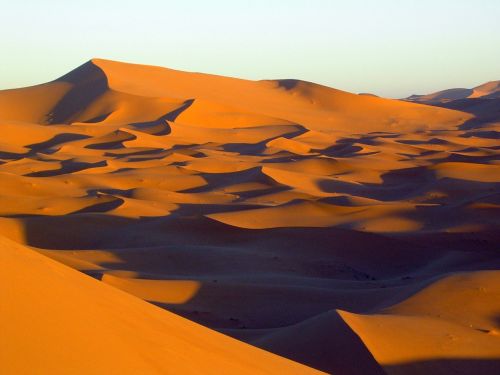 sand dunes shadows landscape