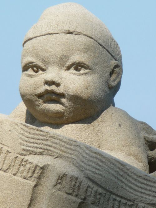 sand sculpture baby face