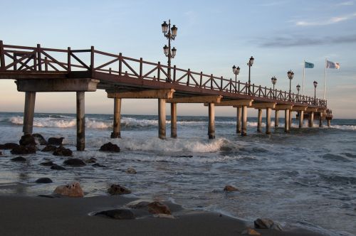 sand stones sea bridge