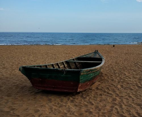 sandy beach boat