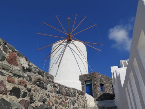 santorini windmill blue sky