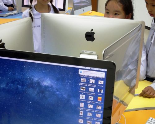 School Students Using Apple Mac
