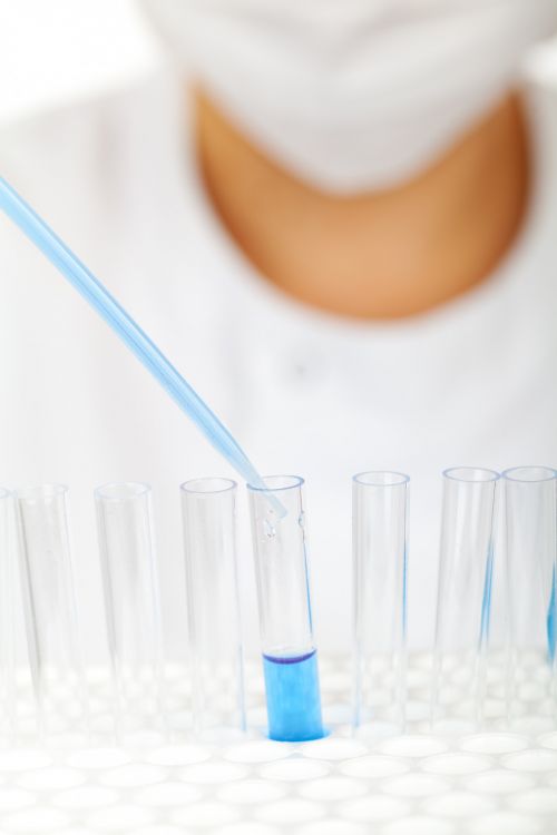 Scientist Fills Test Tubes