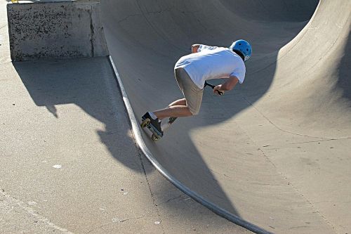 scooting half pipe skateboard