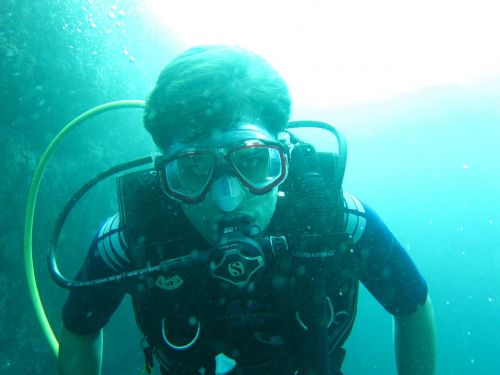 scube diver diving maldives