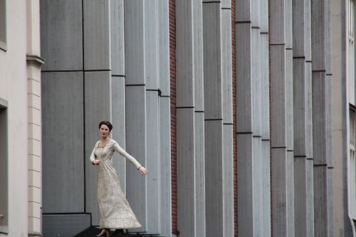 sculpture woman facade