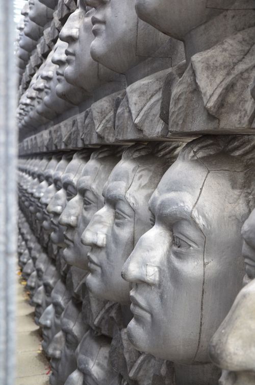 sculpture heads face