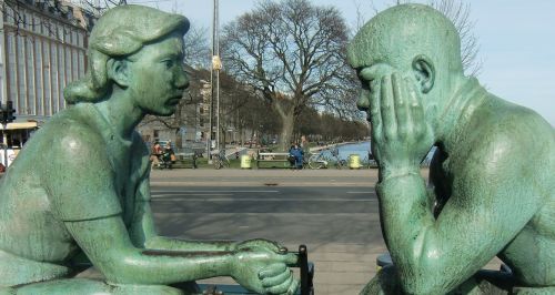 sculpture couple speak