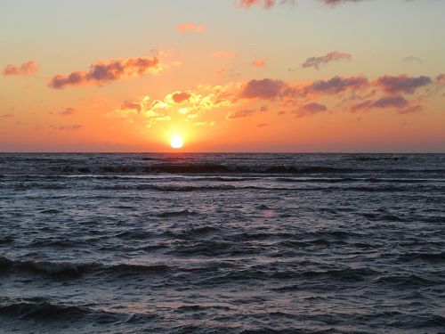 sea setting sun sunset